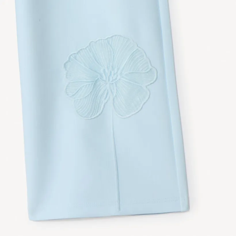 Baggy broek met plooien en geborduurde bloem meisjes