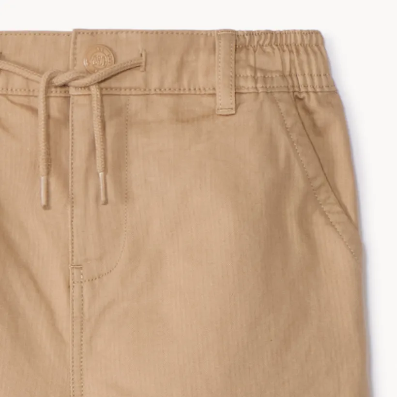 Beige effen broek van stof met elastische taille jongens