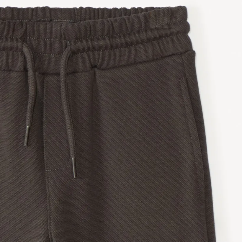 Bermuda in effen molton voor jongen
