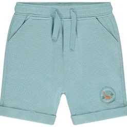 Bermuda in honingraat met dino patch voor baby jongen