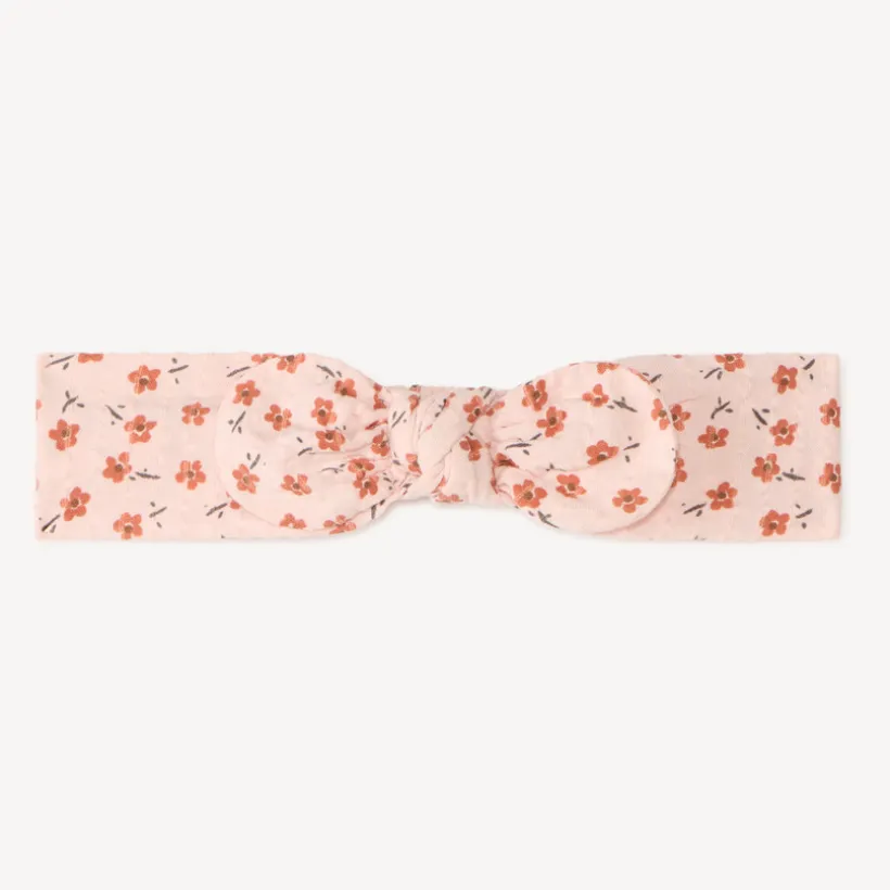 Bloemend meisjes haarband met knoop