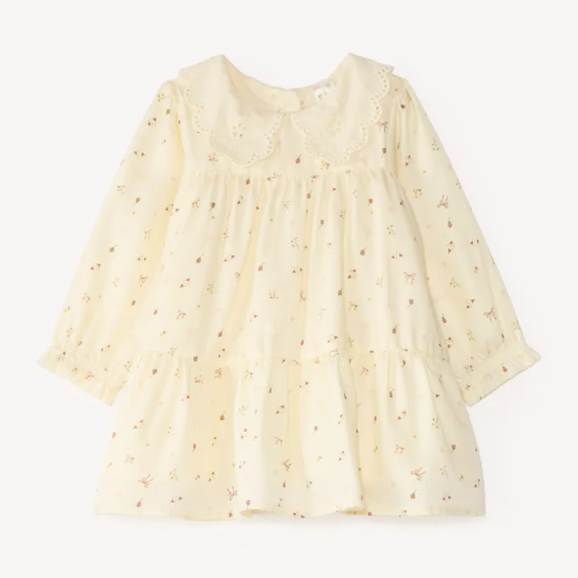 Bloemige jurk voor baby meisje met Engelse borduurrand.