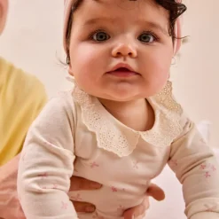 Body met lange mouwen en geborduurde Claudinekraag voor babymeisje