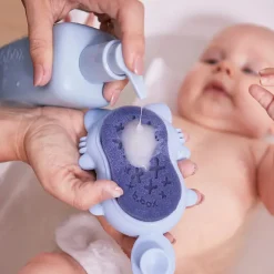 Brosse de bain Rebard avec éponge anti croûtes de lait bleu