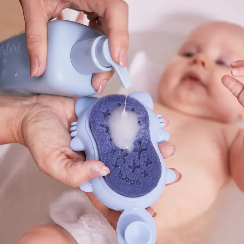 Brosse de bain Rebard avec éponge anti croûtes de lait bleu