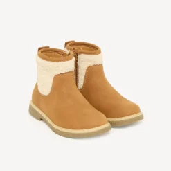 Bruine meisjesboots met rits en schapenvacht inzet.