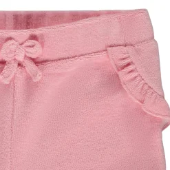 Effen short in badstof met ruches + strik voor baby meisje
