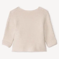 Effen tricot babybustier in mousse ste stitch.