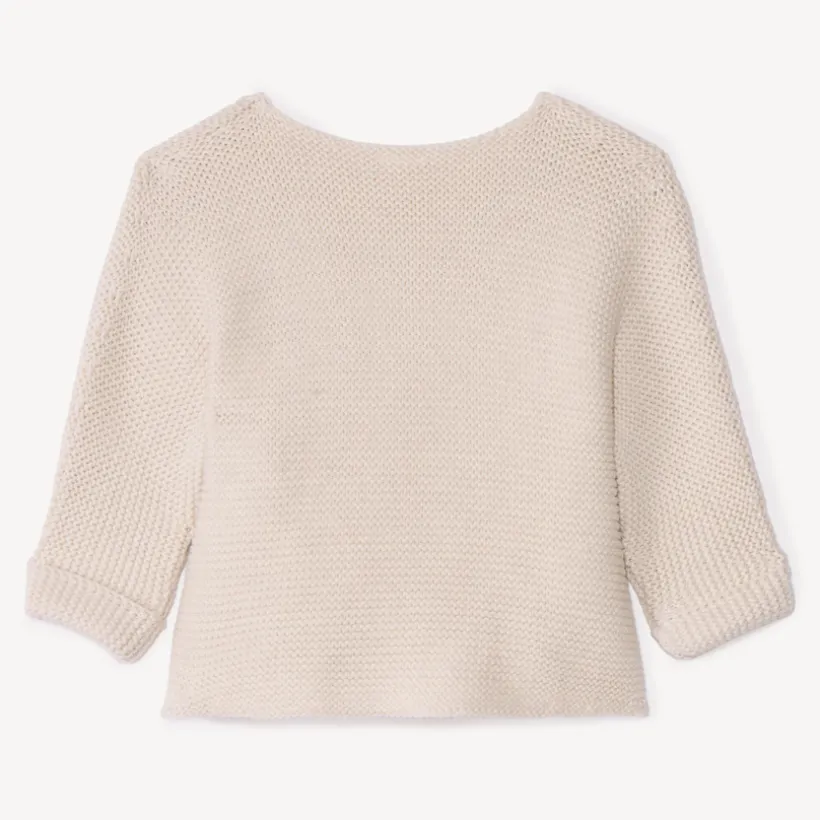 Effen tricot babybustier in mousse ste stitch.