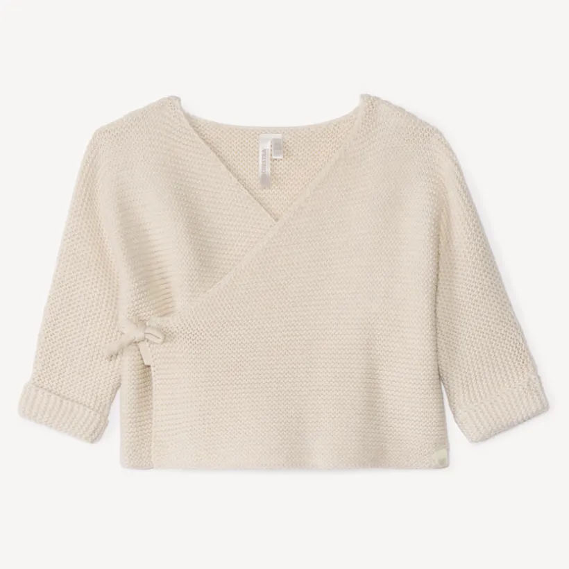 Effen tricot babybustier in mousse ste stitch.