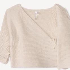 Effen tricot babybustier in mousse ste stitch.