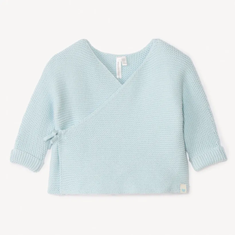 Effen tricot babybustier in mousse ste stitch.