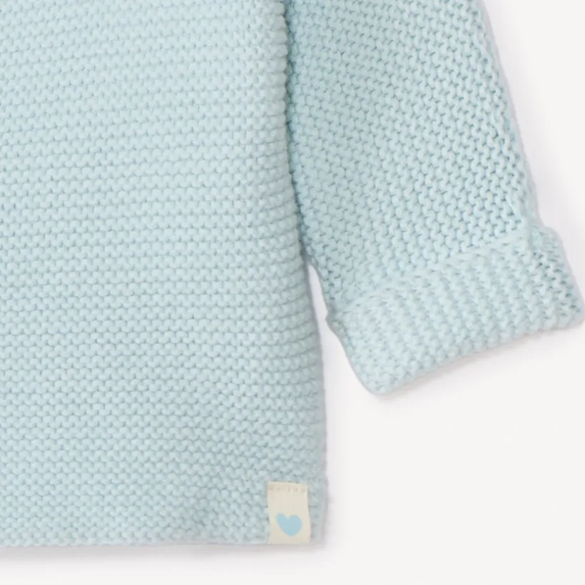 Effen tricot babybustier in mousse ste stitch.