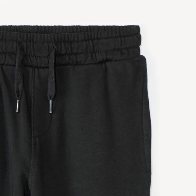 Fleece joggingbroek met borduursel jongens in effen antracietkleur