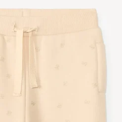 Fleece joggingbroek met glinsterende strikjes voor babymeisje