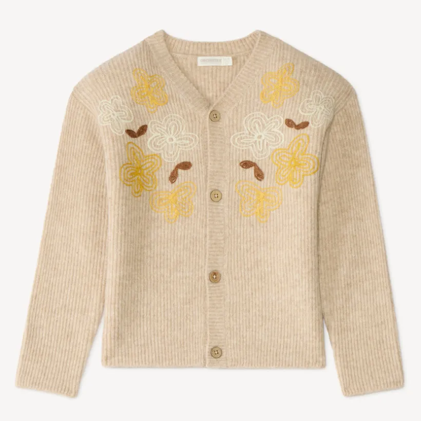 Gebreide meisjesvest met geborduurde bloemen