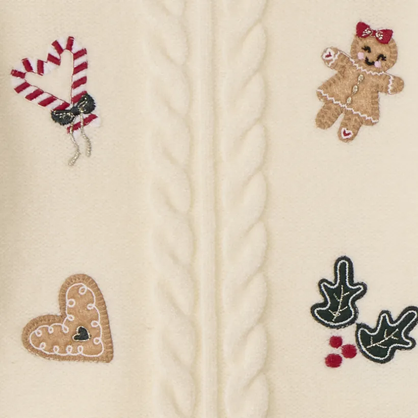 Gebreide trui met kerstpatches van vilt voor babymeisje
