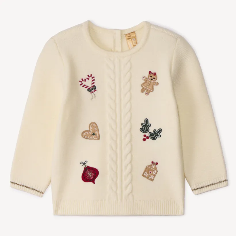 Gebreide trui met kerstpatches van vilt voor babymeisje