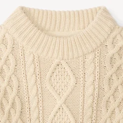 Gebreide trui met vlechteffect en tweekleurige biezen jongens