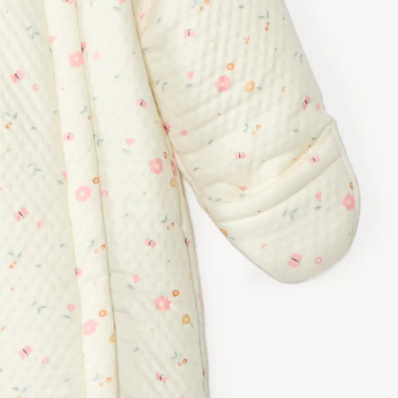Gewatteerd pilotenpak met bloemenprint voor babymeisje met verschillende afwerkingen per leeftijdsperiode