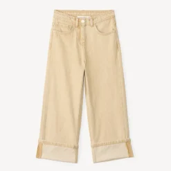 Jeans van effen denim met uitlopende pijpen en vaste omslagen meisjes