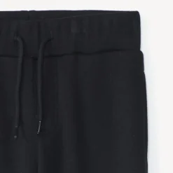 Joggingbroek in effen fleece met sherpa voering jongens