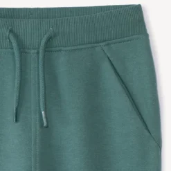 Joggingbroek in effen fleece voor babyjongens met elastische taille en aantrekkoord, twee Italiaanse zakken en aansluitende geribde enkels