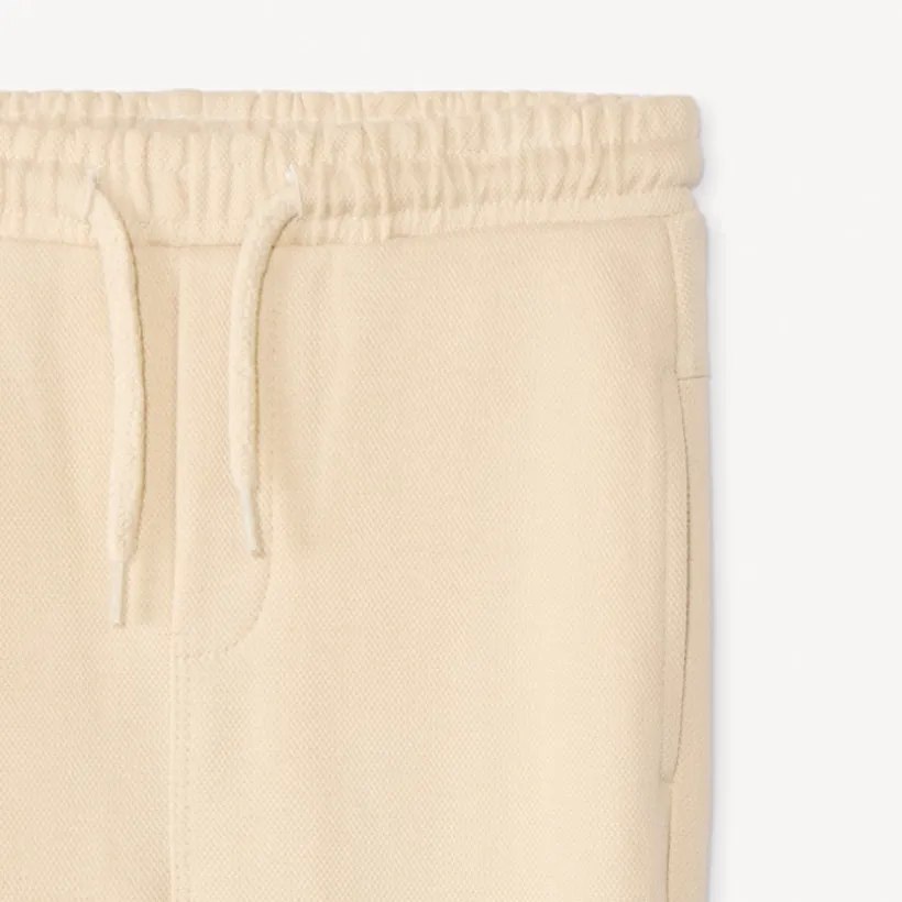 Joggingbroek in effen piqué voor babyjongens