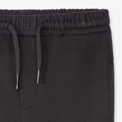 Joggingbroek in effen piqué voor babyjongens