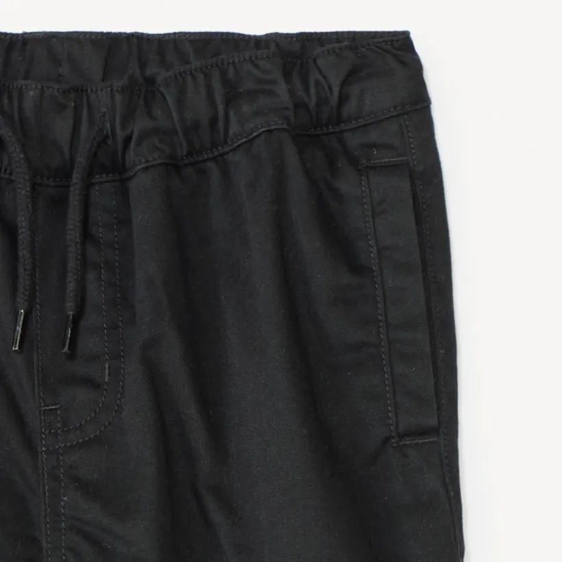 joggingbroek in effen serge met jersey voering jongens, cargo stijl