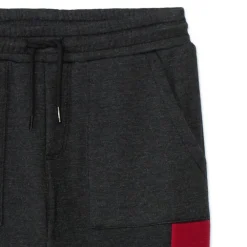 Joggingbroek van fleece met fluweel jongens anthraciet gemêleerd, met elastische taille en trekkoord, Italiaanse zakken en Varsity league-print