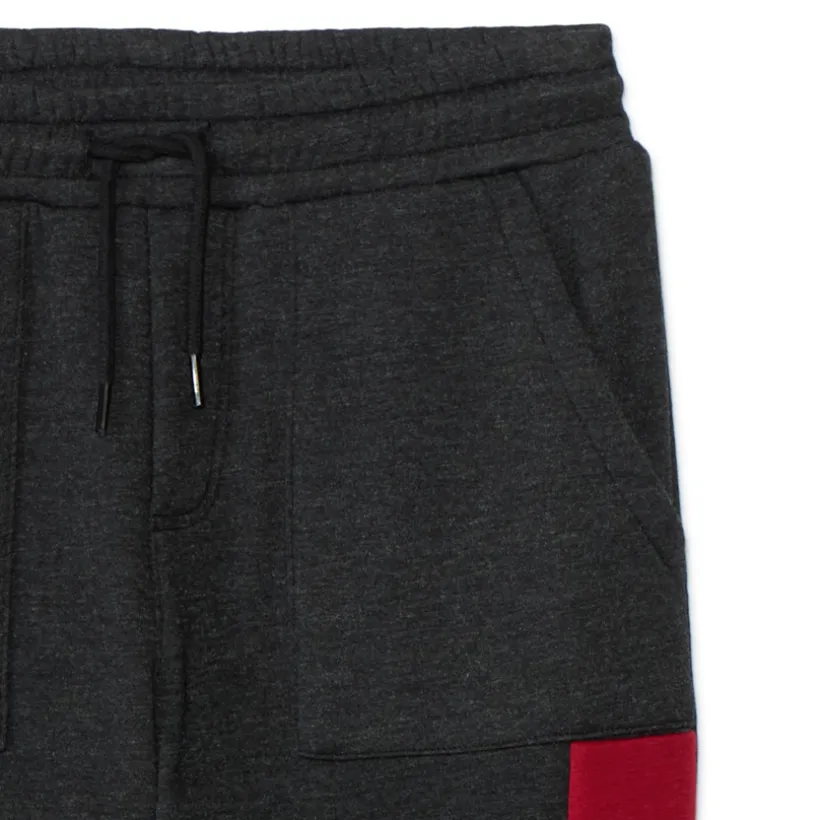 Joggingbroek van fleece met fluweel jongens anthraciet gemêleerd, met elastische taille en trekkoord, Italiaanse zakken en Varsity league-print