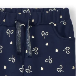 Joggingbroek van fleece met gouden knopen- en hartjesprint meisjes