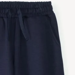 Joggingbroek voor meisjes met een ruime snit, effen kleur.