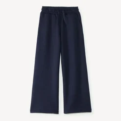 Joggingbroek voor meisjes met een ruime snit, effen kleur.