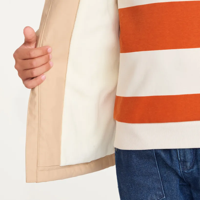 Jongens parka van rubber, gevoerd met microfleece en met capuchon.