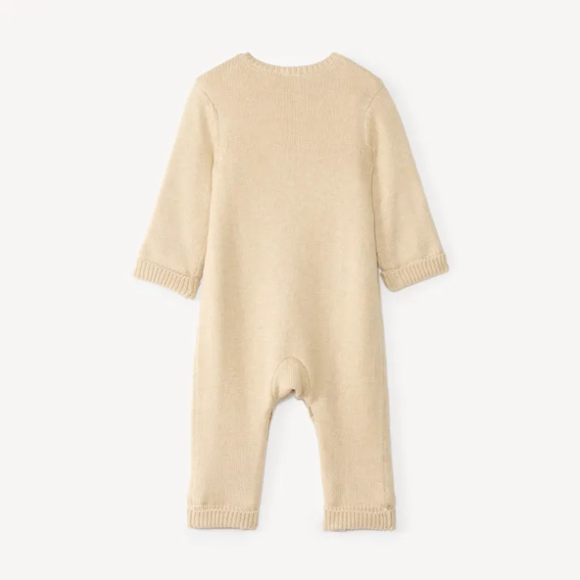 Jumpsuit voor pasgeborenen van gebreid materiaal, gevoerd met fluweel.