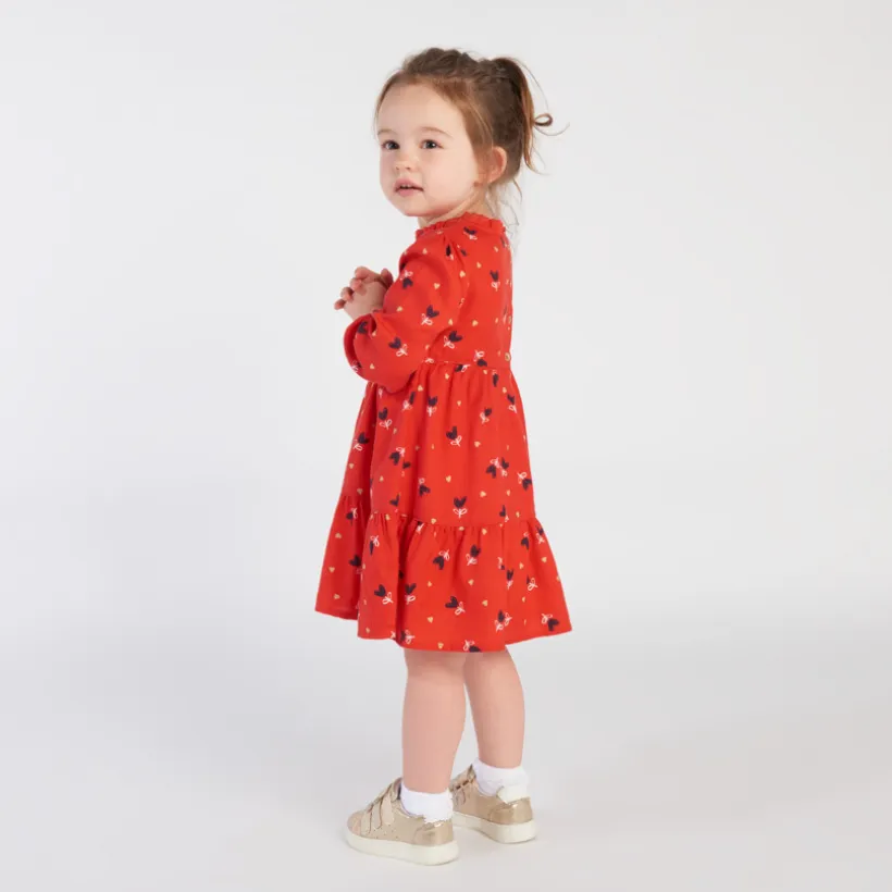 Jurk met lange mouwen, rode serge, allover fantasiehartenprint voor babymeisje
