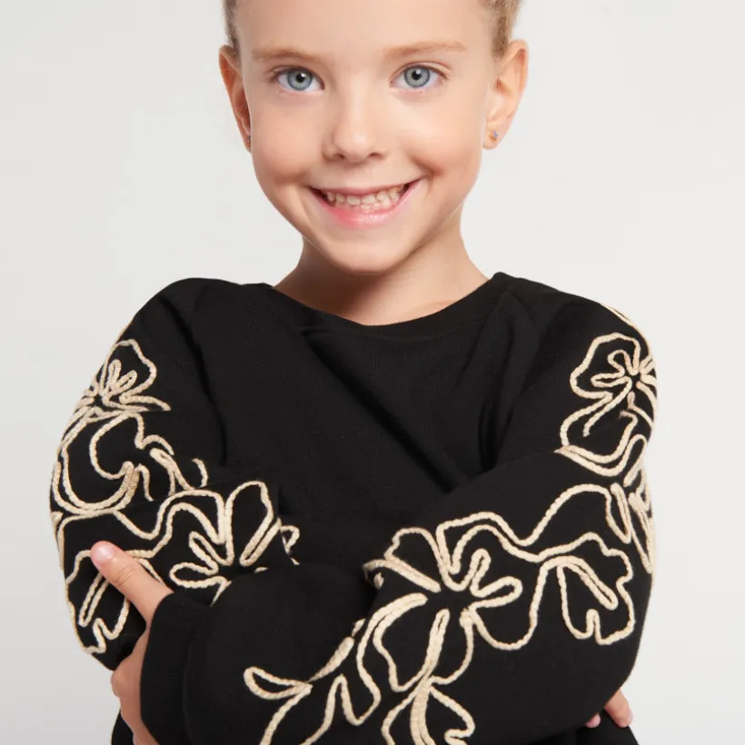 Jurk van effen fleece met geborduurde mouwen meisjes
