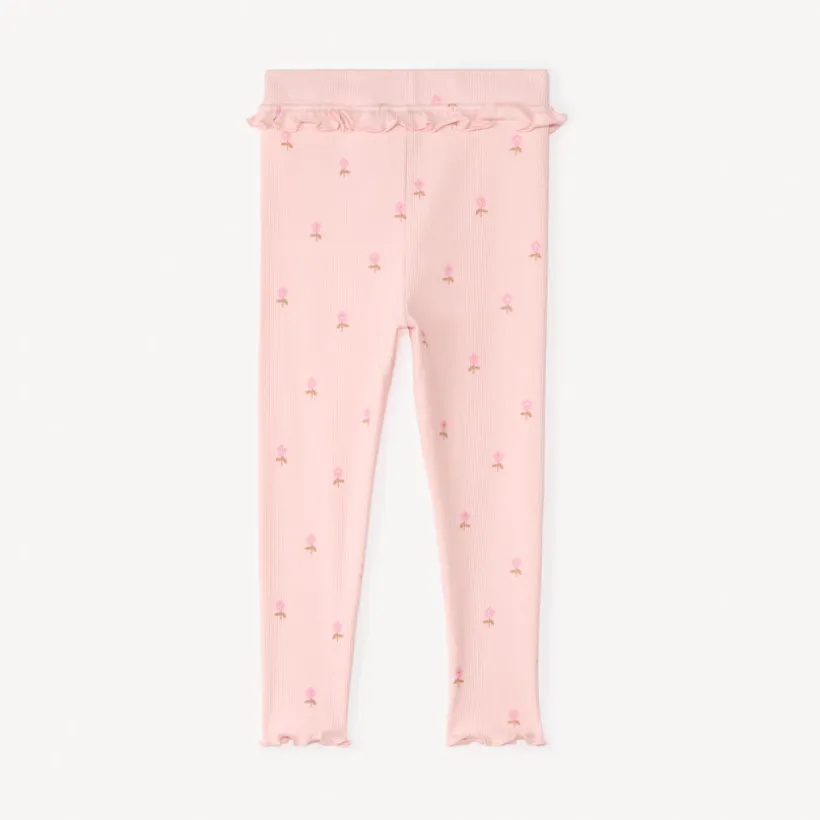 Kinda met ribbelmotief en glitters voor meisjesbaby.