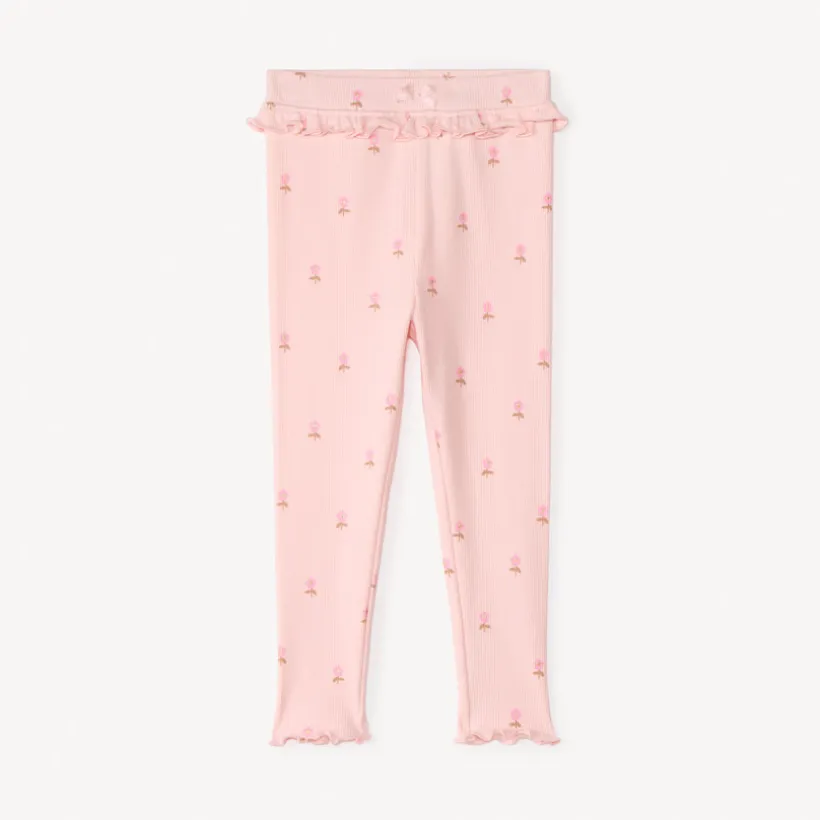 Kinda met ribbelmotief en glitters voor meisjesbaby.