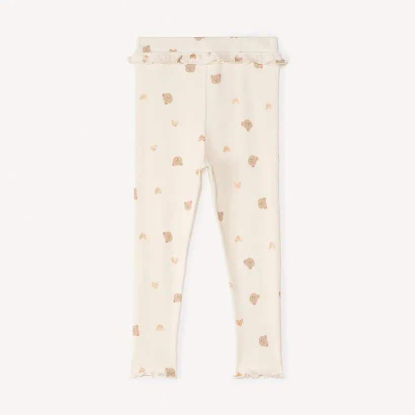 Kinda met ribbelmotief en glitters voor meisjesbaby.