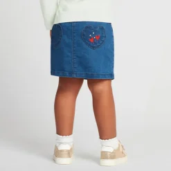 Korte jeanslookrok met stofriem om te knopen voor babymeisje