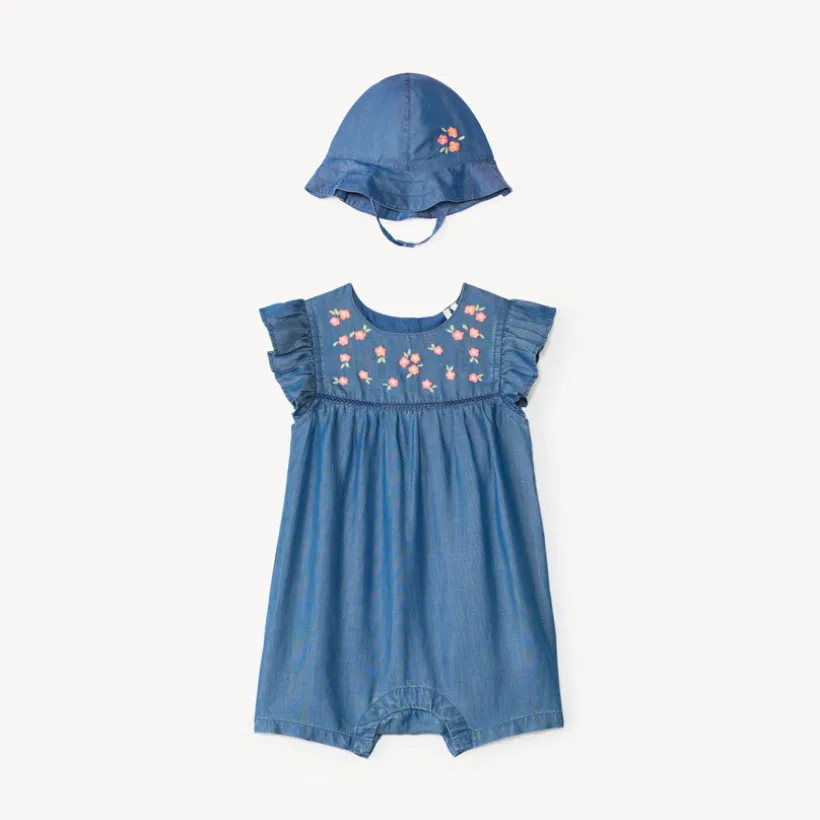 Korte jumpsuit + charlotte in geborduurd tencel met bloemen voor babymeisje