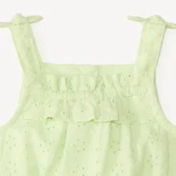 Korte jumpsuit in fantasie Engelse borduur voor meisjesbaby.