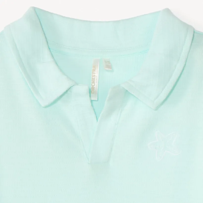 Korte mouw polo in jacquard met geborduurde zee ster voor babyjongen
