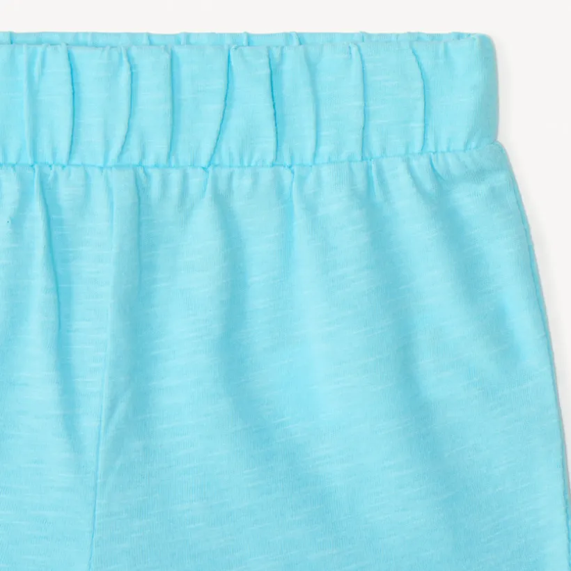 Korte set van 2 stukken: mouwloos shirt met ruffles + short voor babymeisjes.