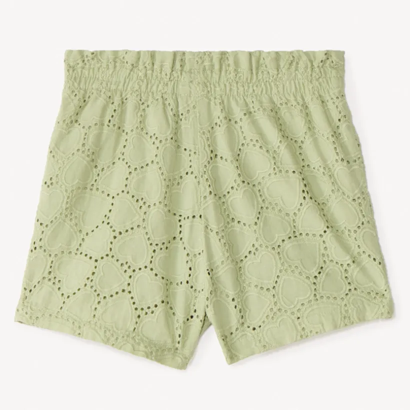 Korte uni met broderie anglaise en een leuke strik voor babymeisjes
