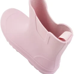 Laarzen van rubber in het roze meisjes