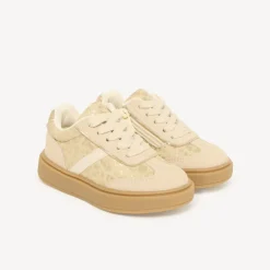 Lage meisjes sneakers met een luipaardprint, elastische veters en rits.